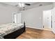 Bedroom with hardwood floors, ceiling fan and ensuite bath at 448 Yorktown Ln, Avon, IN 46123