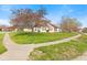 Corner lot home on a sunny day, with fresh grass and mature trees, perfect for a Gathering at 448 Yorktown Ln, Avon, IN 46123