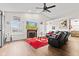 Bright living room featuring a cozy fireplace, hardwood floors, and plenty of natural light for a welcoming atmosphere at 448 Yorktown Ln, Avon, IN 46123