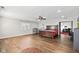 Large main bedroom featuring hardwood floors, ceiling fan, windows, and plenty of space at 448 Yorktown Ln, Avon, IN 46123