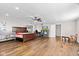 Bright main bedroom with hardwood floors, ceiling fan, and ample space for furnishings at 448 Yorktown Ln, Avon, IN 46123