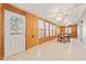 Spacious sunroom with wood paneling, multiple windows and tile floor at 448 Yorktown Ln, Avon, IN 46123