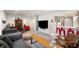 Finished basement with stylish seating, media setup, and open layout to a kitchenette at 4561 Coles Dr, Columbus, IN 47201