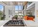 Open-concept living space with vaulted ceilings, large windows, and a scenic lake view at 4561 Coles Dr, Columbus, IN 47201