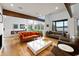 Open living and dining area with water views, hardwood floors and stylish decor at 4561 Coles Dr, Columbus, IN 47201