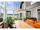 Open living and dining area with water views, hardwood floors and stylish decor at 4561 Coles Dr, Columbus, IN 47201