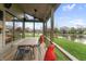 Screened-in back porch with views of the lake at 4561 Coles Dr, Columbus, IN 47201