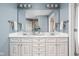 Elegant bathroom boasting double sinks, ample counter space, and stylish fixtures at 4777 Madras Ct, Zionsville, IN 46077