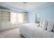 Charming bedroom featuring built-in shelving, a window seat, and a serene, comfortable atmosphere at 4777 Madras Ct, Zionsville, IN 46077