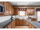 Updated kitchen featuring stainless steel appliances, granite counters and backsplash at 4777 Madras Ct, Zionsville, IN 46077