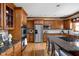 Well-equipped kitchen with stainless steel appliances, granite counters, and ample cabinet space at 4777 Madras Ct, Zionsville, IN 46077