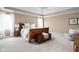 Spacious primary bedroom featuring lots of natural light and neutral color palette at 4777 Madras Ct, Zionsville, IN 46077