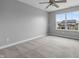 Bright, carpeted bedroom with a large window offering neighborhood views and an abundance of natural light at 4831 E Oak Hill E Dr, Lebanon, IN 46052