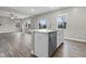 Kitchen island featuring a sink and stainless steel dishwasher at 4831 E Oak Hill E Dr, Lebanon, IN 46052