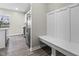 Mudroom featuring bench seating and stainless steel appliances at 4831 E Oak Hill E Dr, Lebanon, IN 46052