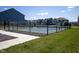 Fenced outdoor pickleball court, perfect for recreational fun and friendly competition in a welcoming community at 4831 E Oak Hill E Dr, Lebanon, IN 46052