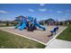 Community playground with slides and swings offering outdoor fun for on a beautiful day at 4831 E Oak Hill E Dr, Lebanon, IN 46052