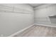 A walk-in closet with sturdy, adjustable white wire shelving offering ample storage solutions for an organized wardrobe at 4831 E Oak Hill E Dr, Lebanon, IN 46052