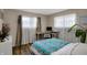 Bedroom featuring neutral paint, desk, and lots of natural light at 500 N Shellbark Rd, Muncie, IN 47304