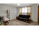 Bedroom featuring a futon and light neutral colors at 500 N Shellbark Rd, Muncie, IN 47304