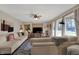 Bright and open living room featuring cozy sofas, modern decor, and ample natural light at 500 N Shellbark Rd, Muncie, IN 47304