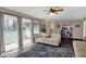 Inviting living room with large windows, comfortable seating, and stylish decor, perfect for relaxation at 500 N Shellbark Rd, Muncie, IN 47304