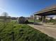 Inviting backyard with a storage shed, a gazebo, and scenic views of the surrounding neighborhood at 52 Spring Lake Ct, Trafalgar, IN 46181