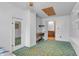 Bedroom featuring a closet and view of a desk at 5301 Old Smith Valley Rd, Greenwood, IN 46143