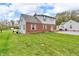 Two-story home with a well-maintained lawn, brick and siding exterior, and welcoming curb appeal at 5301 Old Smith Valley Rd, Greenwood, IN 46143