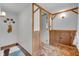 Hallway featuring wood panelling and a view to the lower level at 5301 Old Smith Valley Rd, Greenwood, IN 46143