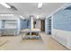 Expansive room with ample lighting and workspace, suitable for various purposes and storage at 5301 Old Smith Valley Rd, Greenwood, IN 46143