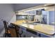 Stylish breakfast bar with stainless steel sink and updated features at 5431 Carlton Ct, Indianapolis, IN 46224