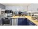 Updated kitchen showcasing stainless steel appliances and stylish countertops at 5431 Carlton Ct, Indianapolis, IN 46224