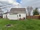 Spacious backyard with a patio featuring outdoor seating and a grill, perfect for entertaining and relaxation at , Cicero, IN 46034