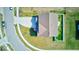 Aerial view of the house showcasing a roof, lawn, and driveway at 5839 Altar Bell Cir, Greenwood, IN 46143