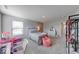 room includes a desk, play area, and lots of natural light at 5839 Altar Bell Cir, Greenwood, IN 46143