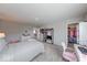 Bedroom features a walk-in closet, gray walls, and neutral carpet at 5839 Altar Bell Cir, Greenwood, IN 46143
