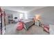 bedroom includes a desk, bean bag chair, and bright natural light at 5839 Altar Bell Cir, Greenwood, IN 46143