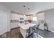 Well-lit kitchen with island, barstool seating, stainless steel appliances and ample cabinet space at 5839 Altar Bell Cir, Greenwood, IN 46143