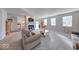 Bright living room showcasing a fireplace, neutral tones, and an open layout at 5839 Altar Bell Cir, Greenwood, IN 46143