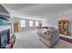 Inviting living room featuring neutral décor, a fireplace, and abundant natural light at 5839 Altar Bell Cir, Greenwood, IN 46143
