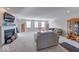 Spacious living room with fireplace, recessed lighting, and neutral carpet at 5839 Altar Bell Cir, Greenwood, IN 46143