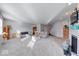 Expansive living area with a fireplace, recessed lights, and neutral carpeting at 5839 Altar Bell Cir, Greenwood, IN 46143