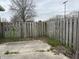 View of fenced backyard and patio at 6005 Wingedfoot Ct, Indianapolis, IN 46254