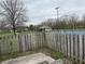 View of fenced backyard and community features at 6005 Wingedfoot Ct, Indianapolis, IN 46254