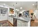 Modern kitchen with stainless appliances, white cabinets, sleek countertops, and open layout at 622 E 10Th St # 303, Indianapolis, IN 46202