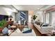Inviting living room with hardwood floors, sofas, and decorative accents at 622 E 10Th St # 303, Indianapolis, IN 46202