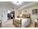 Main bedroom with a walk-in closet, a large bed, and stylish decor at 622 E 10Th St # 303, Indianapolis, IN 46202