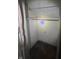 Empty closet with worn walls and a wooden rod at 630 Congress Ave, Indianapolis, IN 46208
