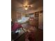 Kitchen featuring a vintage ceiling fan, and dated cabinetry, needing remodeling at 630 Congress Ave, Indianapolis, IN 46208